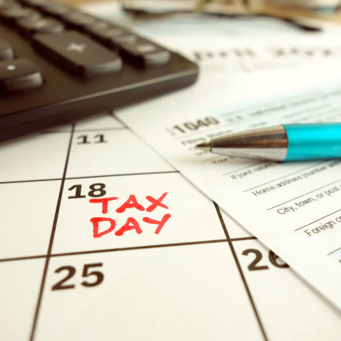 Tax day circled on a calendar